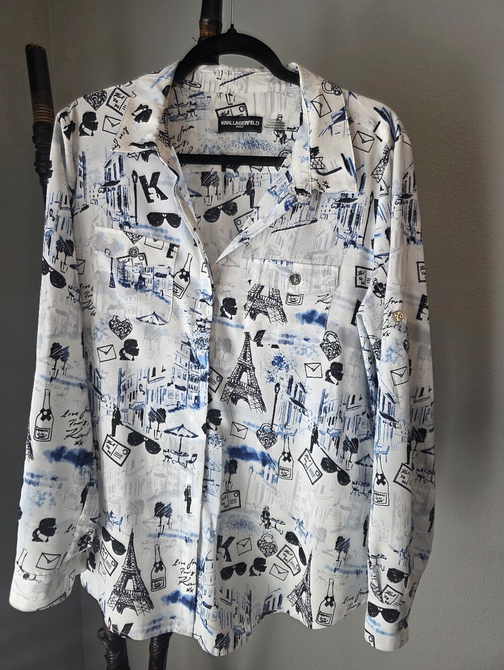 Karl Lagerfeld White and Blue Graphic Blouse. 28 1/2 long, 22" chest.
